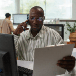 Accountant on CPA firm phone system holding a clipboard