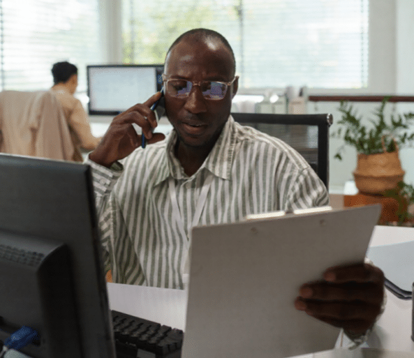 Accountant on CPA firm phone system holding a clipboard